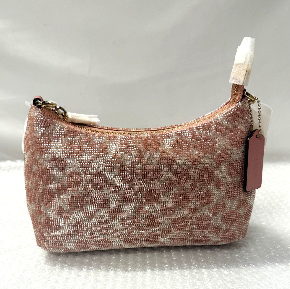Small patterned handbag with a 'Fancy Tokyo Tokyo' tag on a white background